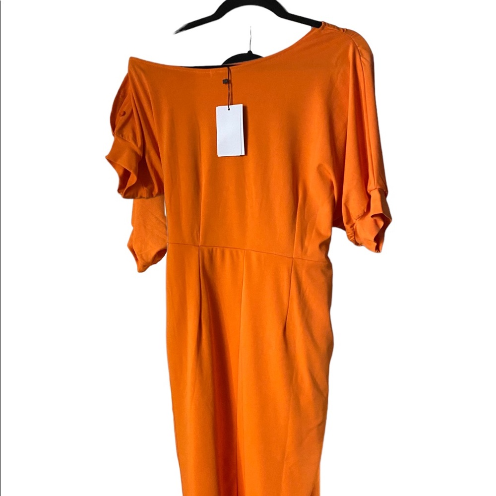 Orange off the shoulder dress.